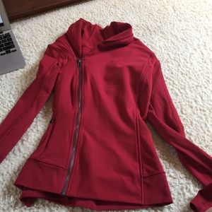 red zip up jacket